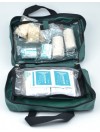 Trousse de secours verte souple à compartiments garnie avec fermeture à zip